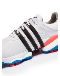 weiße und schwarze Sportschuhe von ADIDAS GOLF