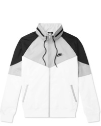 weiße und schwarze Windjacke von Nike