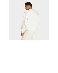 weißer Pullover mit einem Rundhalsausschnitt von adidas Sportswear