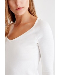 weißer Pullover mit einem V-Ausschnitt von OXXO