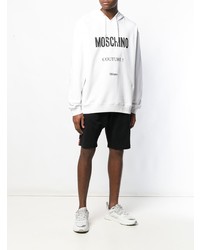 weißer und schwarzer bedruckter Pullover mit einem Kapuze von Moschino