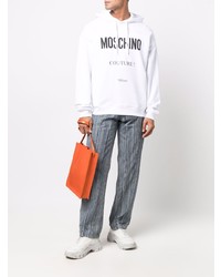 weißer und schwarzer bedruckter Pullover mit einem Kapuze von Moschino