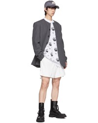 weißer und schwarzer bedruckter Pullover mit einem Rundhalsausschnitt von We11done