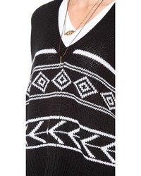 weißer und schwarzer Pullover mit einem Rundhalsausschnitt mit Norwegermuster von Feel The Piece