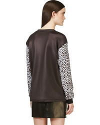 weißer und schwarzer Pullover mit einem Rundhalsausschnitt mit Leopardenmuster von Balmain