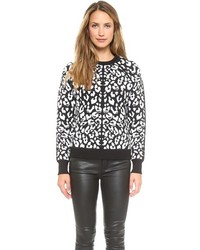weißer und schwarzer Pullover mit einem Rundhalsausschnitt mit Leopardenmuster von Torn By Ronny Kobo