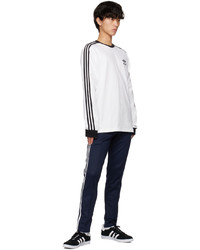 weißes horizontal gestreiftes Langarmshirt von adidas Originals