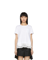 weißes Spitze T-Shirt mit einem Rundhalsausschnitt mit Rüschen
