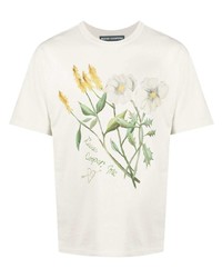 weißes T-Shirt mit einem Rundhalsausschnitt mit Blumenmuster von Reese Cooper® 