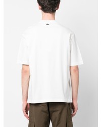 weißes T-Shirt mit einem Rundhalsausschnitt mit geometrischem Muster von Lacoste