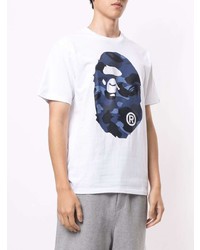 weißes und dunkelblaues bedrucktes T-Shirt mit einem Rundhalsausschnitt von A Bathing Ape