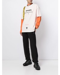 weißes und schwarzes bedrucktes T-Shirt mit einem Rundhalsausschnitt von AAPE BY A BATHING APE