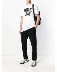 weißes und schwarzes bedrucktes T-Shirt mit einem Rundhalsausschnitt von Nike