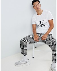 weißes und schwarzes bedrucktes T-Shirt mit einem Rundhalsausschnitt von Calvin Klein Jeans