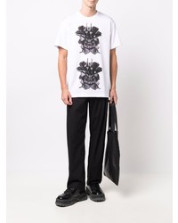 weißes und schwarzes bedrucktes T-Shirt mit einem Rundhalsausschnitt von Comme Des Garcons Homme Plus