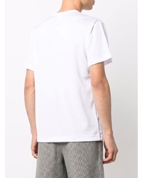 weißes und schwarzes bedrucktes T-Shirt mit einem Rundhalsausschnitt von Comme Des Garcons Homme Plus