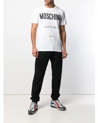 weißes und schwarzes bedrucktes T-Shirt mit einem Rundhalsausschnitt von Moschino