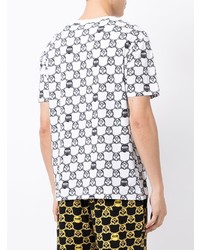 weißes und schwarzes bedrucktes T-Shirt mit einem Rundhalsausschnitt von Moschino