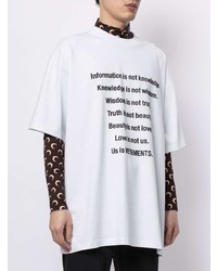 weißes und schwarzes bedrucktes T-Shirt mit einem Rundhalsausschnitt von Vetements