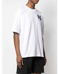 weißes und schwarzes bedrucktes T-Shirt mit einem Rundhalsausschnitt von Champion