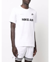 weißes und schwarzes bedrucktes T-Shirt mit einem Rundhalsausschnitt von Nike