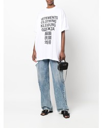 weißes und schwarzes bedrucktes T-Shirt mit einem Rundhalsausschnitt von Vetements