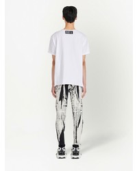 weißes und schwarzes bedrucktes T-Shirt mit einem Rundhalsausschnitt von Balmain