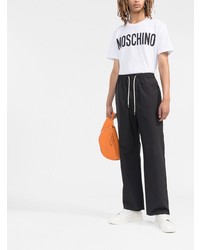 weißes und schwarzes bedrucktes T-Shirt mit einem Rundhalsausschnitt von Moschino