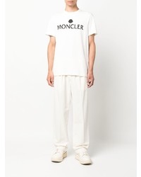 weißes und schwarzes bedrucktes T-Shirt mit einem Rundhalsausschnitt von Moncler