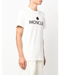 weißes und schwarzes bedrucktes T-Shirt mit einem Rundhalsausschnitt von Moncler