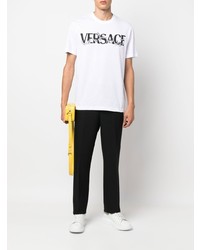 weißes und schwarzes bedrucktes T-Shirt mit einem Rundhalsausschnitt von Versace