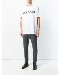 weißes und schwarzes bedrucktes T-Shirt mit einem Rundhalsausschnitt von Versace