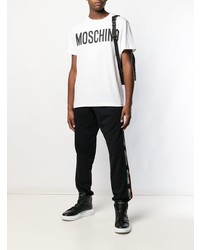 weißes und schwarzes bedrucktes T-Shirt mit einem Rundhalsausschnitt von Moschino