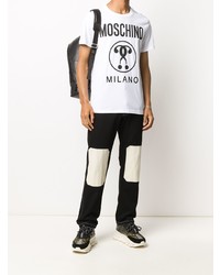 weißes und schwarzes bedrucktes T-Shirt mit einem Rundhalsausschnitt von Moschino