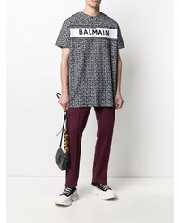 weißes und schwarzes bedrucktes T-Shirt mit einem Rundhalsausschnitt von Balmain