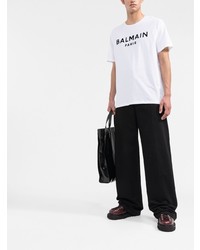 weißes und schwarzes bedrucktes T-Shirt mit einem Rundhalsausschnitt von Balmain