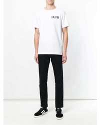 weißes und schwarzes bedrucktes T-Shirt mit einem Rundhalsausschnitt von Calvin Klein Jeans