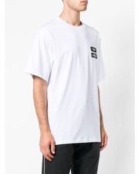 weißes und schwarzes bedrucktes T-Shirt mit einem Rundhalsausschnitt von MSGM