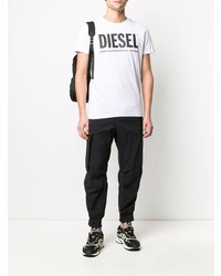 weißes und schwarzes bedrucktes T-Shirt mit einem Rundhalsausschnitt von Diesel