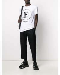 weißes und schwarzes bedrucktes T-Shirt mit einem Rundhalsausschnitt von Balmain