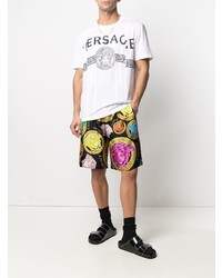 weißes und schwarzes bedrucktes T-Shirt mit einem Rundhalsausschnitt von Versace