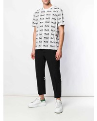 weißes und schwarzes bedrucktes T-Shirt mit einem Rundhalsausschnitt von McQ Alexander McQueen