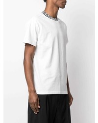 weißes und schwarzes bedrucktes T-Shirt mit einem Rundhalsausschnitt von Ambush