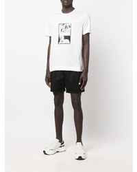 weißes und schwarzes bedrucktes T-Shirt mit einem Rundhalsausschnitt von Limitato
