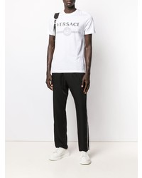 weißes und schwarzes bedrucktes T-Shirt mit einem Rundhalsausschnitt von Versace