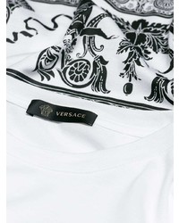 weißes und schwarzes bedrucktes T-Shirt mit einem Rundhalsausschnitt von Versace