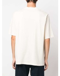 weißes und schwarzes bedrucktes T-Shirt mit einem Rundhalsausschnitt von MONCLE