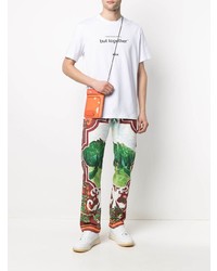 weißes und schwarzes bedrucktes T-Shirt mit einem Rundhalsausschnitt von MSGM