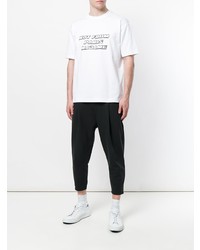 weißes und schwarzes bedrucktes T-Shirt mit einem Rundhalsausschnitt von Drôle De Monsieur