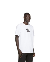 weißes und schwarzes bedrucktes T-Shirt mit einem Rundhalsausschnitt von adidas Originals